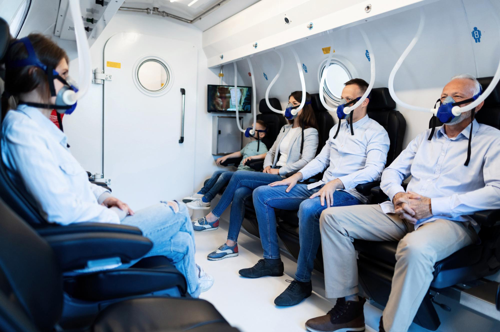 Doctor reviewing a scan on a monitor with a patient